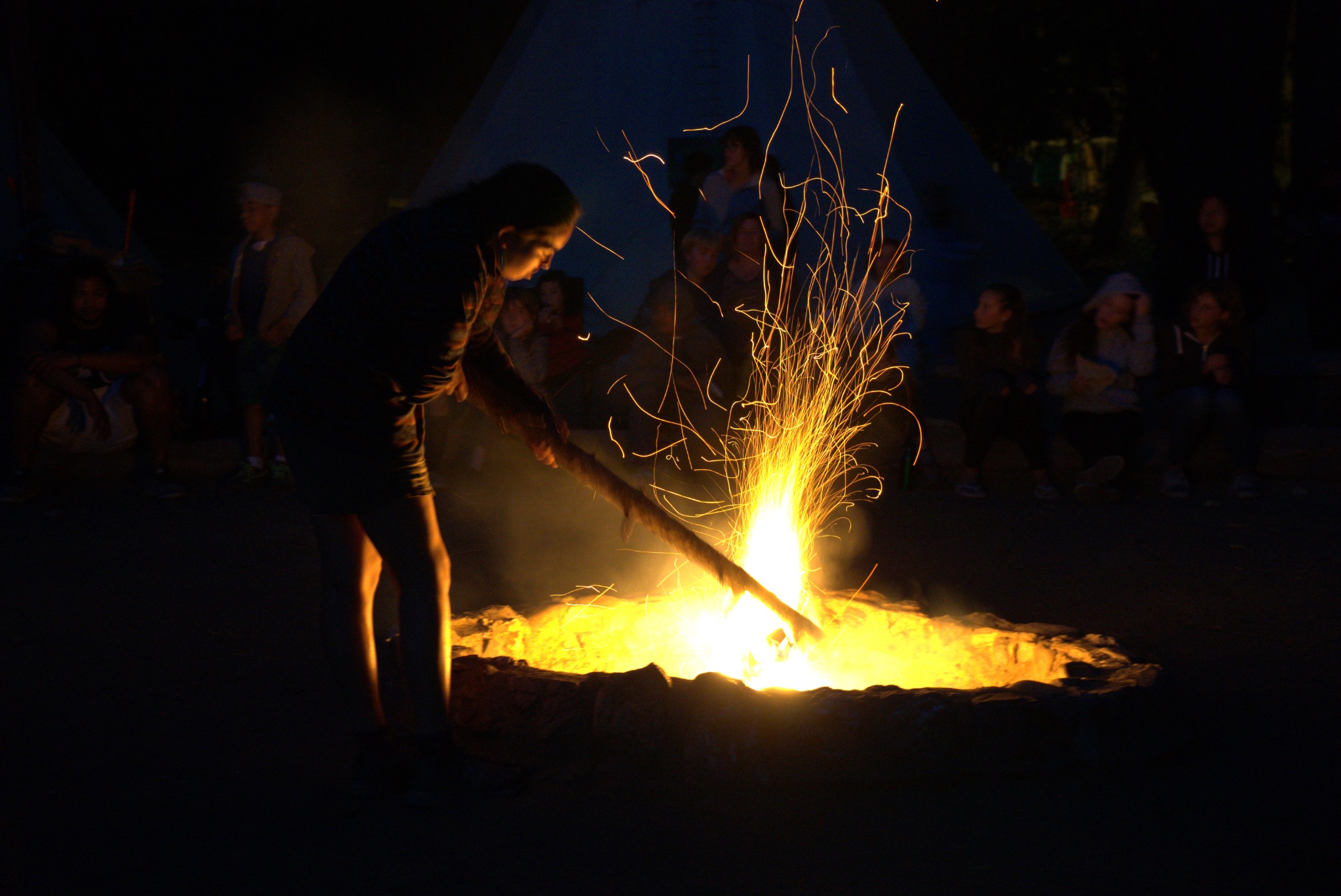 Fire circle at camp at night